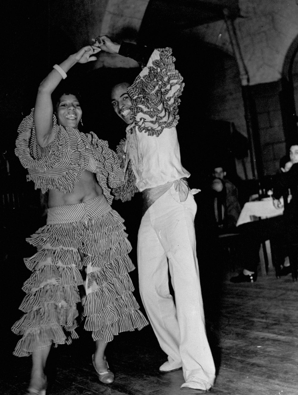 A view of people dancing at a Cuban club