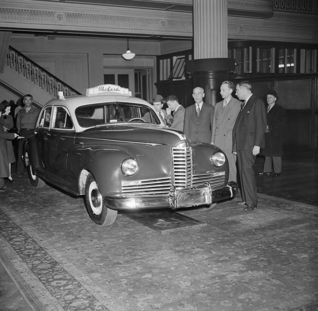 Packard Officials Introducing New Postwar Taxi