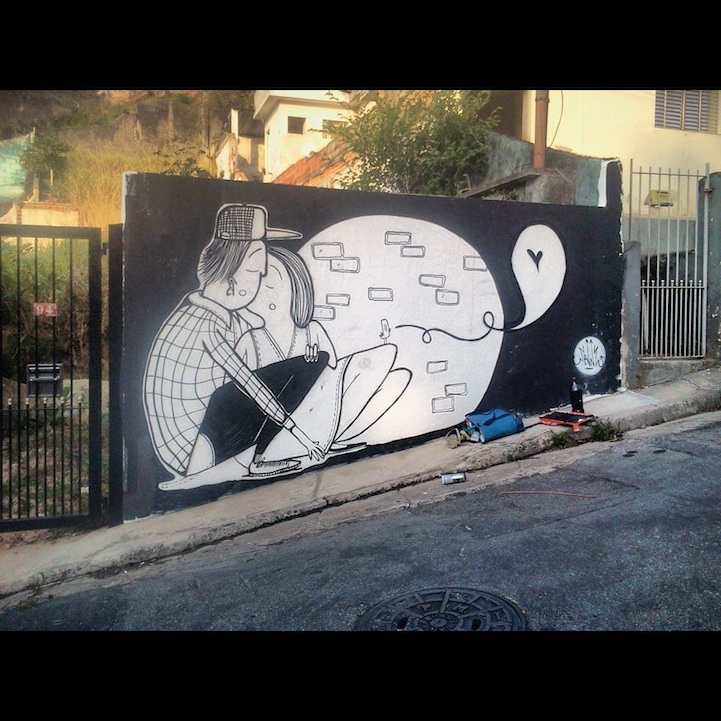 Street art bisous - graffiti de dos chicos besandose