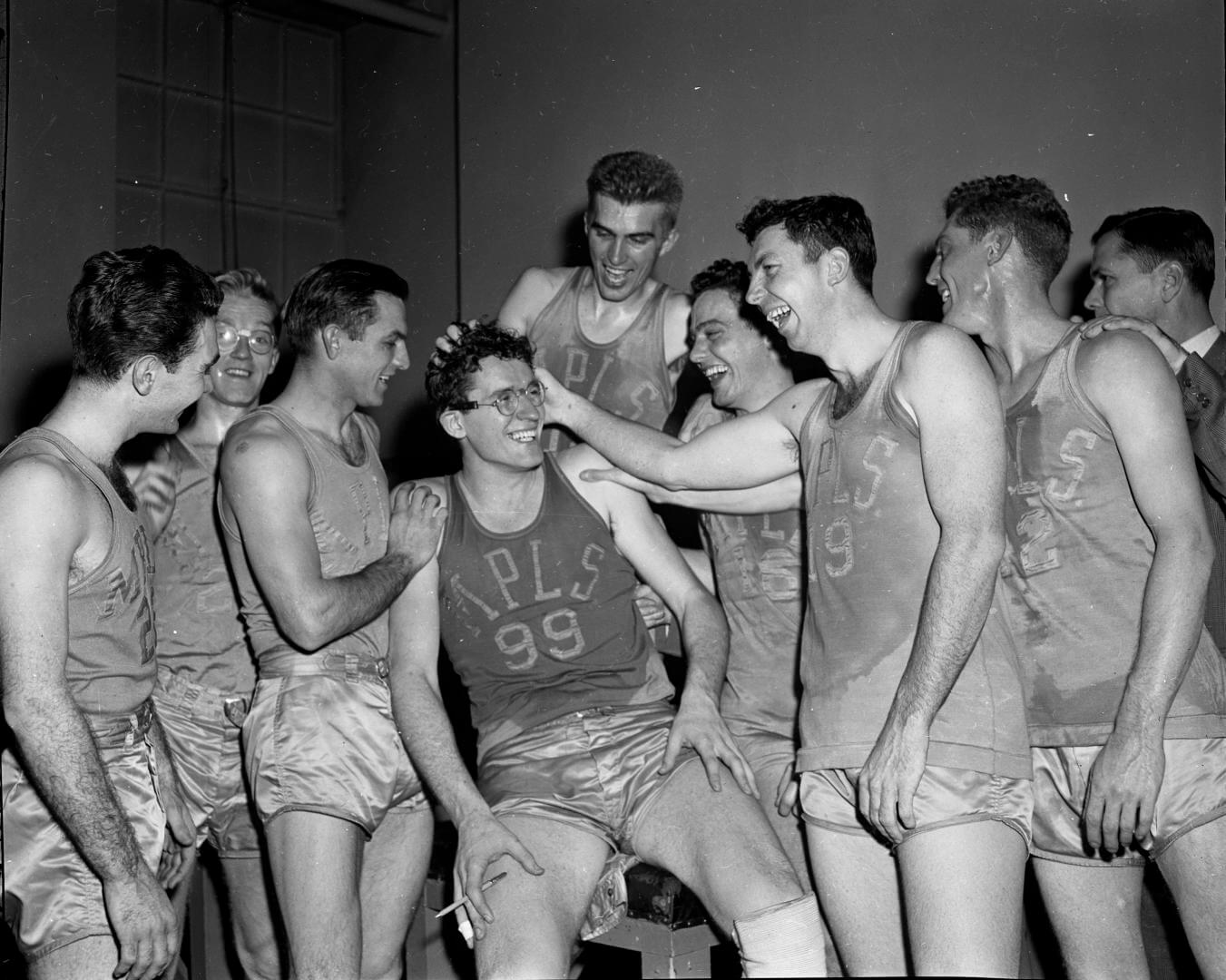 Minnneapolis Lakers teammates congradulate George Milken after the 6-foot 10-inch wizard racked up 48 points in a 101-74 victory against the New York Knicks at Madison Square Garden. (Photo by Bill Meurer/NY Daily News via Getty Images)
