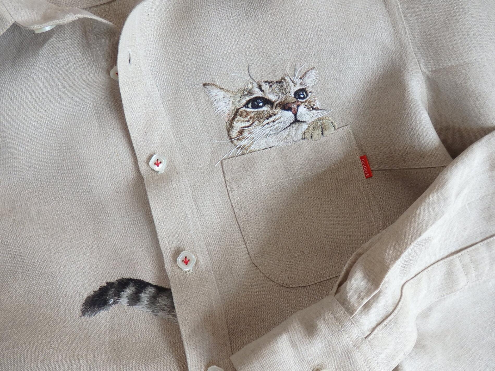 Hiroko Kubota gatos en bolsillos bordados